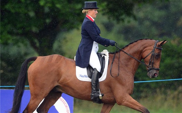 Zara Phillips sports a visible baby bump during on her horse High Kingdom at the Festival of British Eventing. Photo via www.telegraph.co.uk 