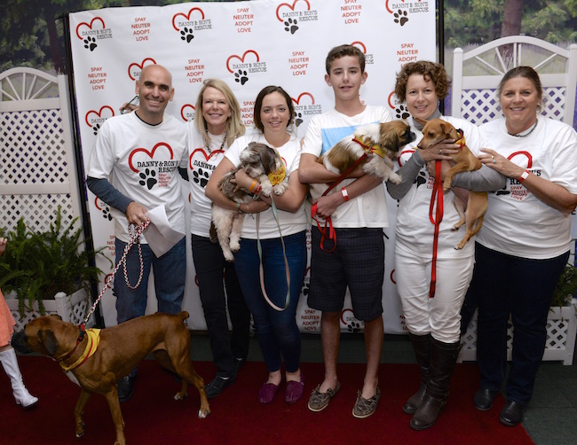 Volunteers introduce the adoptable dogs to the guests of the 7th Annual Danny & Ron's Lip Sync